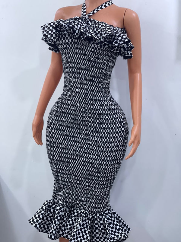 Criss cross neckline smoked dress in black and white ankara